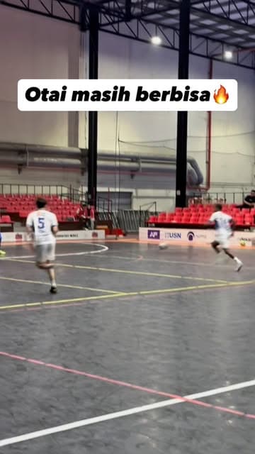 PJJ players in the white away kit breaking forward on court